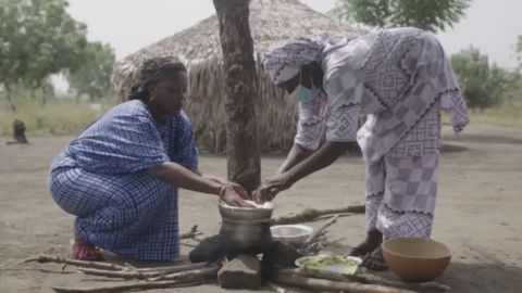 Binta (left) visits a Fulani village in Ghana to source local ingredients and find inspiration for her Dine on a Mat culinary experience.