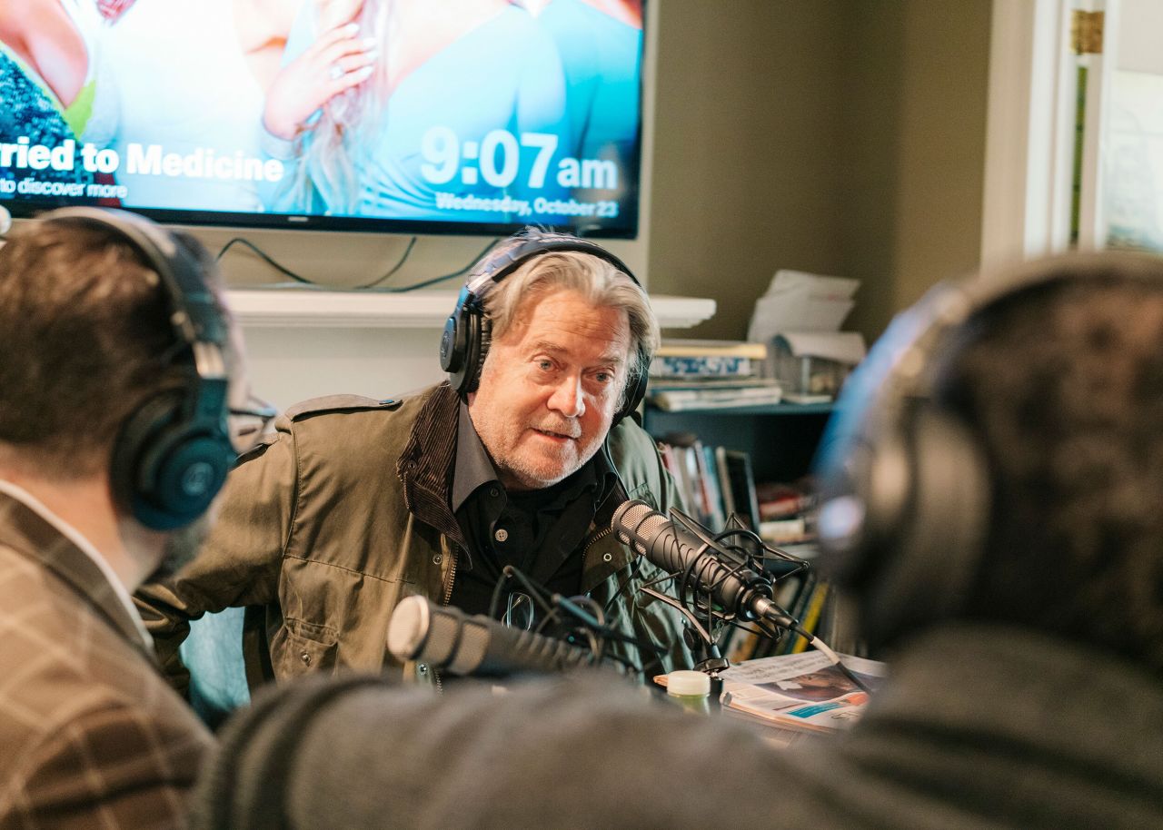 Bannon records a segment of his radio show "War Room" from his home in Washington, DC, in October 2019.