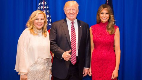 Sherry Xue Li, left, is pictured with then-President Donald Trump and then-first lady Melania Trump at a fundraiser on June 28, 2017. 