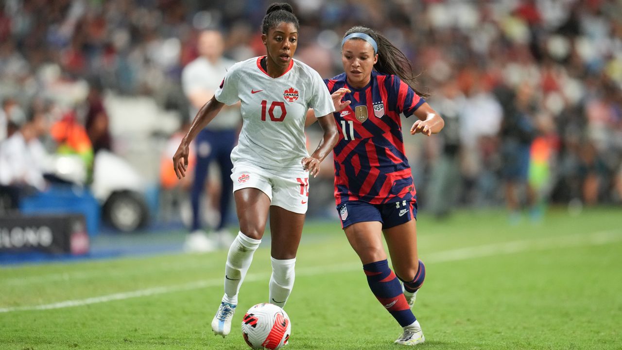 Canada's Ashley Lawrence battles for the ball with US forward Sophia Smith during the Concacaf W final.