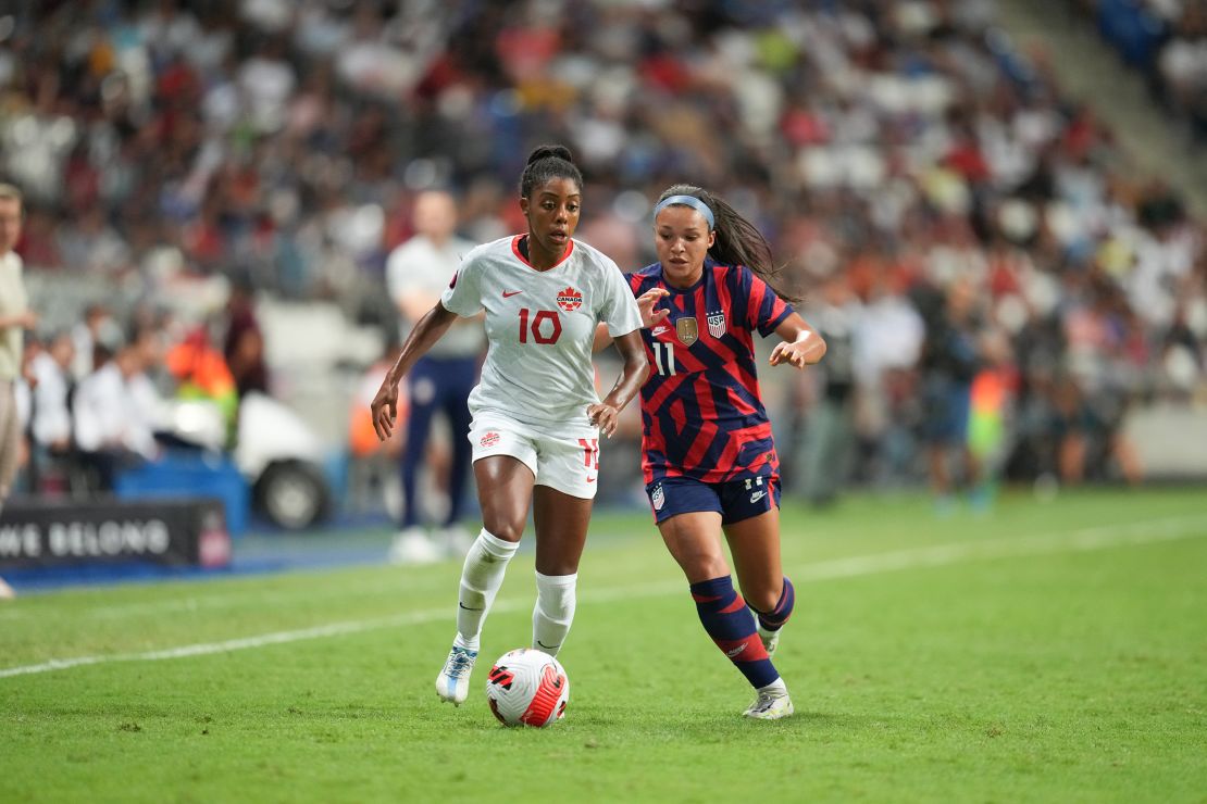 Canada's Ashley Lawrence battles for the ball with US forward Sophia Smith during the Concacaf W final.