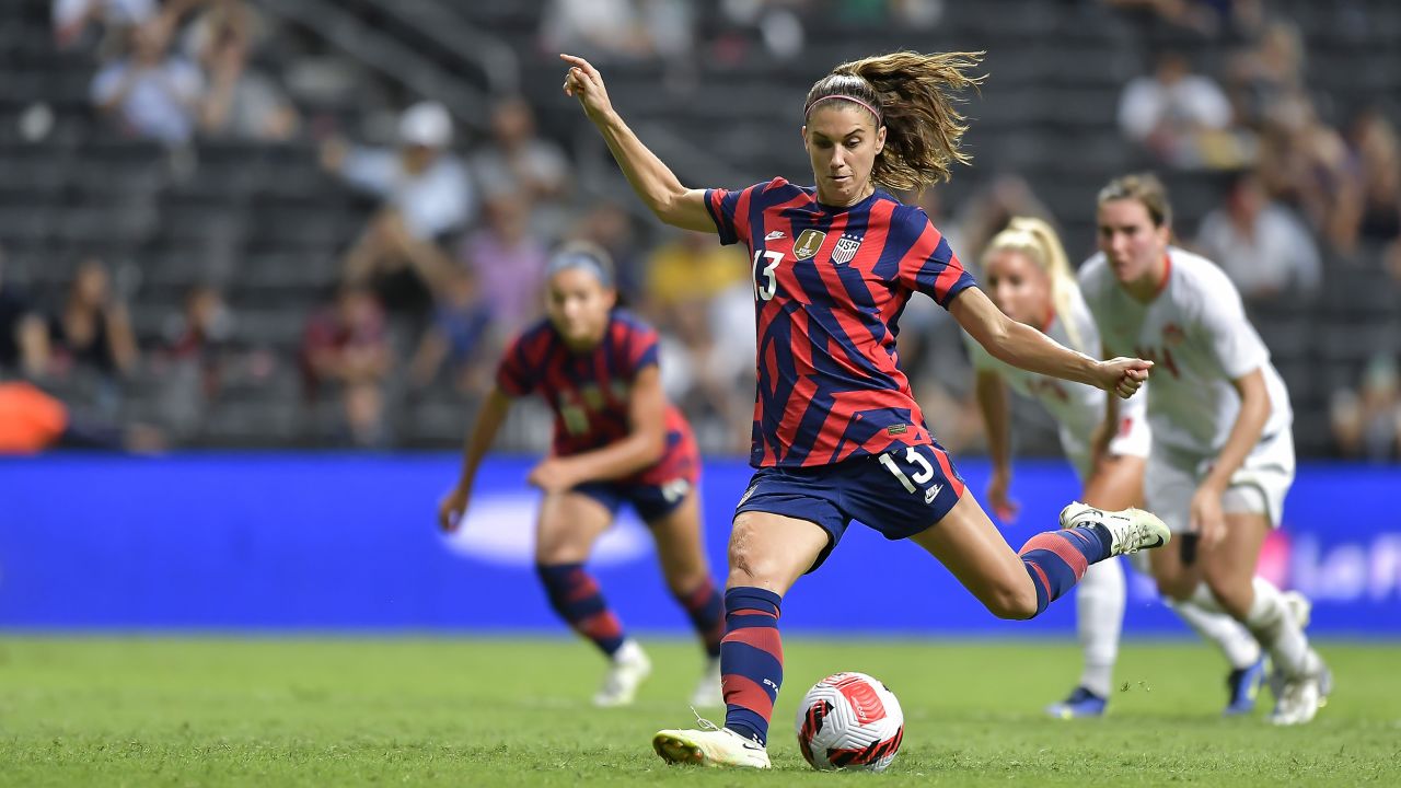Alex Morgan taking the penalty that won the championship.