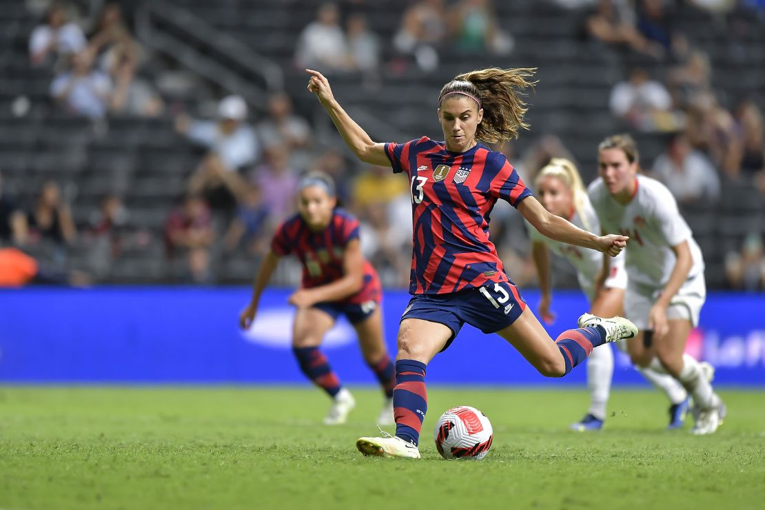 Alex Morgan taking the penalty that won the championship.