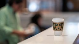 A Starbucks branded coffee cup inside a shop in San Francisco, California, U.S., on Thursday, July 22, 2021. 