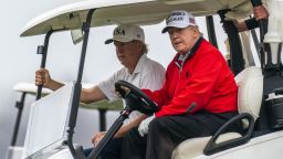President Donald Trump, drives his golf cart as he plays golf at the Trump National Golf Club in Sterling, Va., Saturday, Nov. 21, 2020. (AP Photo/Manuel Balce Ceneta)