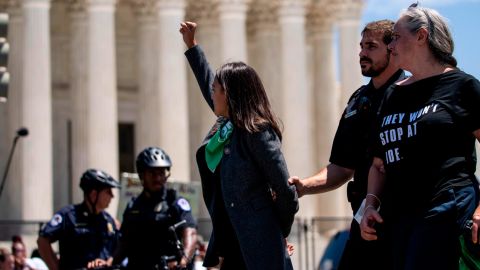 Rep. Alexandria Ocasio-Cortez is seen outside the Supreme Court of the United States during a sit-in protest on Capitol Hill on Tuesday.