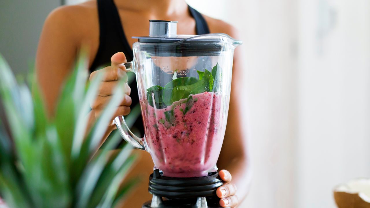 A green smoothie made from spinach, berries, bananas and almond milk kick-starts your morning.
