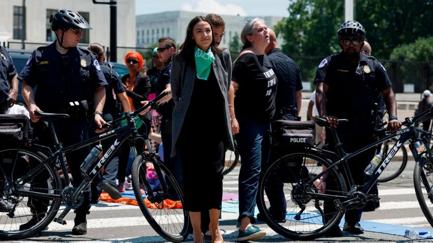 WASHINGTON, DC - JULY 19: Rep. Alexandria Ocasio-Cortez (D-NY) is detained after participating in a sit in with activists from Center for Popular Democracy Action (CPDA) in front of the U.S. Supreme Court Building on July 19, 2022 in Washington, DC. The CPDA held the protest with House Democrats in support of abortion rights. (Photo by Anna Moneymaker/Getty Images)