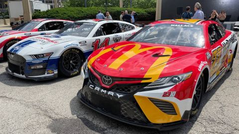 The NASCAR Cup Series cars of Bubba Wallace (No. 23), Chase Briscoe (No. 14) and Ross Chastain (No. 1) lined up in Chicago ahead of Tuesday's announcement.