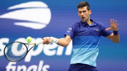 NEW YORK, NEW YORK - SEPTEMBER 12: Novak Djokovic of Serbia returns the ball against Daniil Medvedev of Russia during their Men's Singles final match on Day Fourteen of the 2021 US Open at the USTA Billie Jean King National Tennis Center on September 12, 2021 in the Flushing neighborhood of the Queens borough of New York City.  (Photo by Matthew Stockman/Getty Images)
