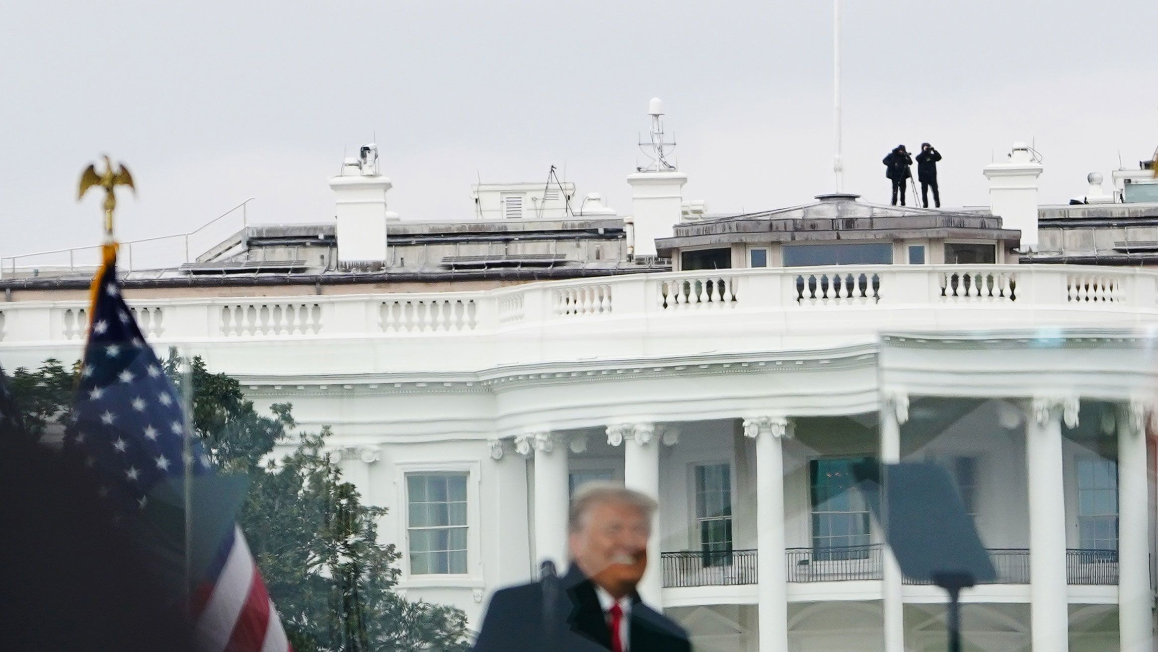 Members of the Secret Service patrol from the roof of the White House as President Donald Trump speaks to supporters from The Ellipse on January 6, 2021.