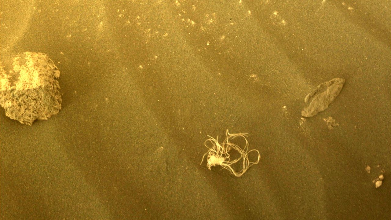 NASA's Perseverance rover captured a photo of a small bundle of string while exploring Jezero Crater. 
