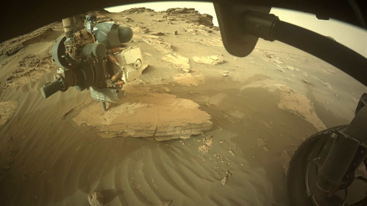 The rover's front right hazard avoidance camera captured a wider image of the string (bottom). 