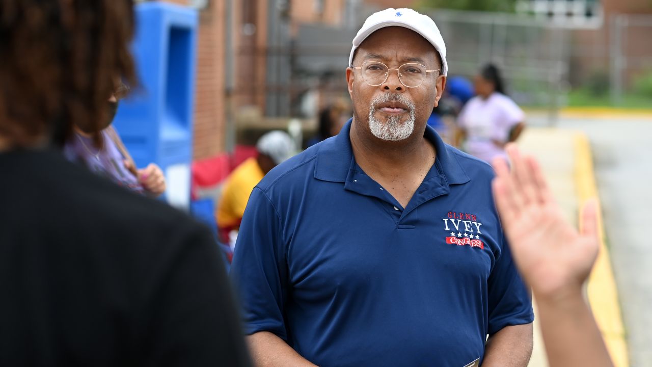 Democratic congressional candidate Glenn Ivey waits to greet a voter at Surrattsville High School on Tuesday July 19, 2022 in Clinton, Maryland.