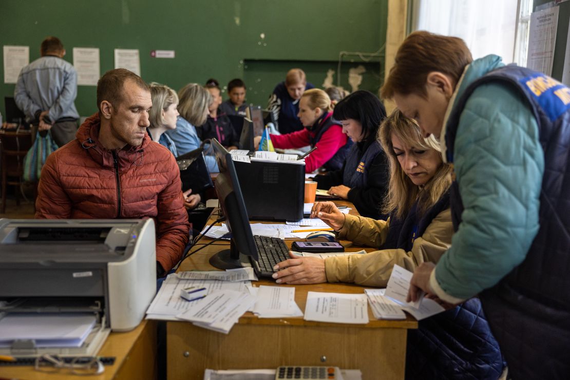 Internally displaced Ukrainians registering with authorities in Kryvyi Rih in May.