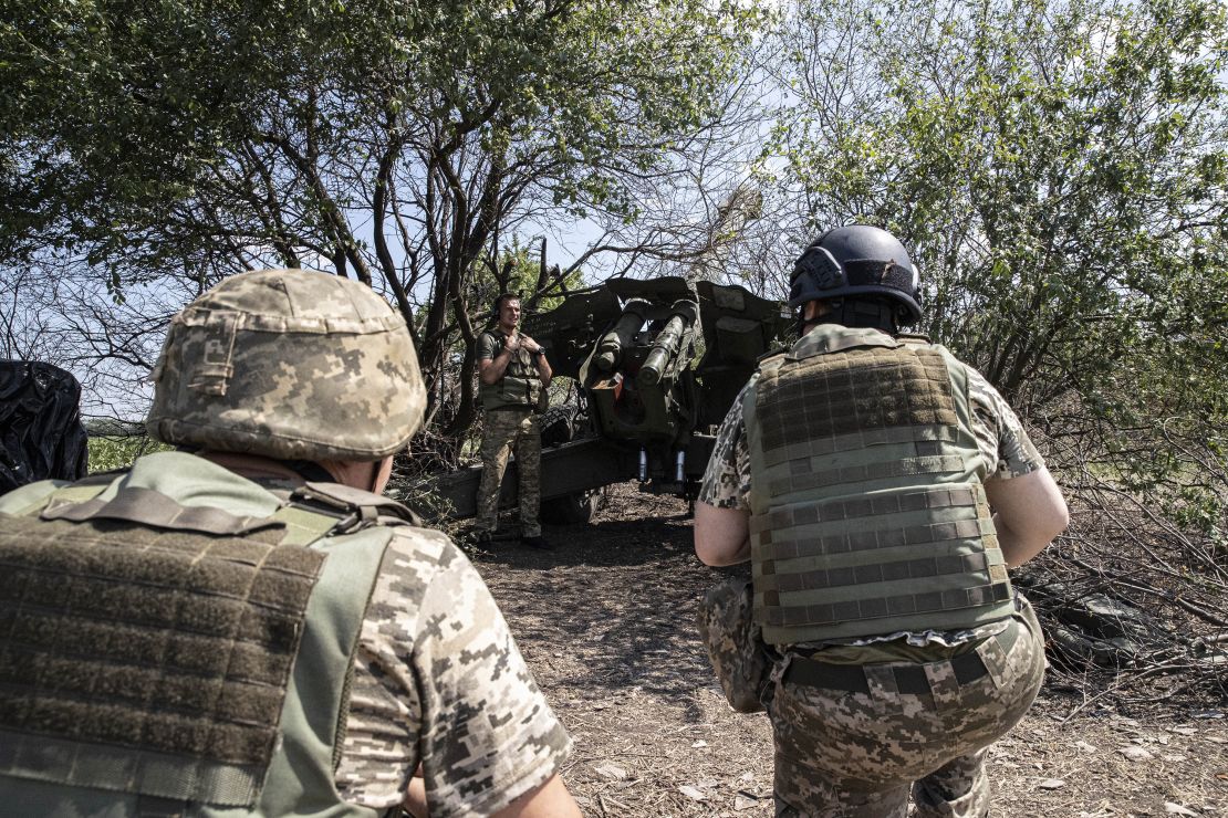 Ukrainian artillerymen checking equipment in Kherson on July 15, 2022.