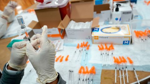 A nurse preps a syringe at a pop-up Covid-19 vaccination site at the Albanian Islamic Cultural Center, April 8, 2021, in the New York borough of Staten Island.