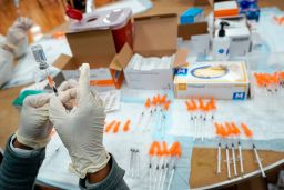 A nurse preps a syringe at a pop-up Covid-19 vaccination site at the Albanian Islamic Cultural Center, April 8, 2021, in the New York borough of Staten Island.