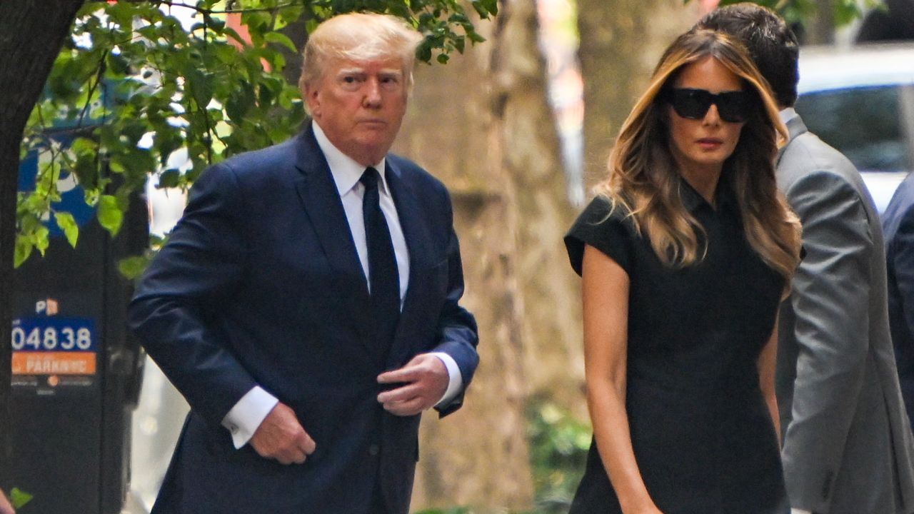Former President Donald Trump and former first lady Melania Trump arrive for the funeral.