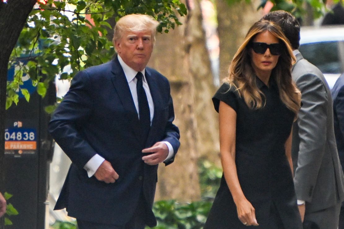 Former President Donald Trump and former first lady Melania Trump arrive for the funeral.