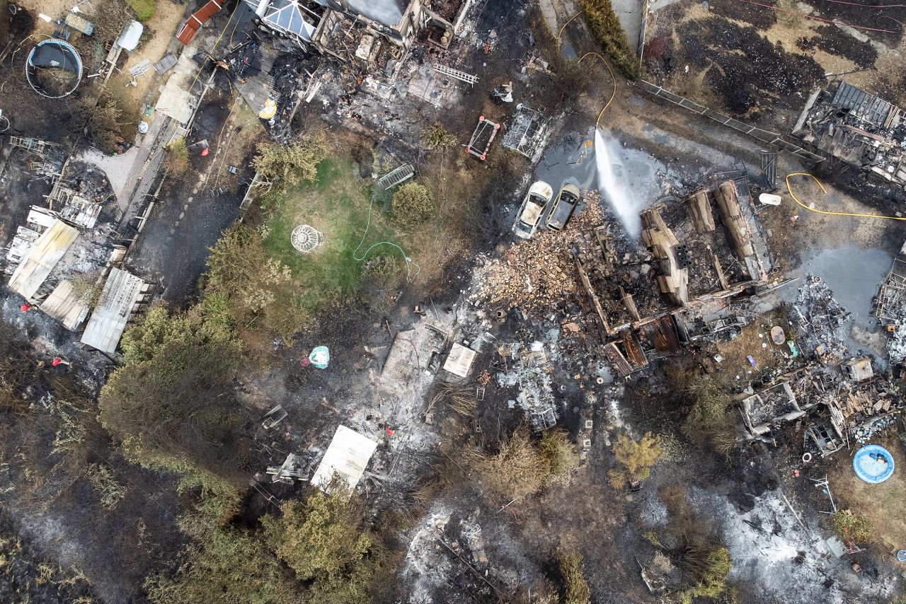 This aerial photo shows destruction in a residential area following a large blaze in London on July 20.