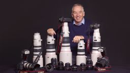 Sports photographer David Cannon poses with camera gear on March 7, 2017 in London,England.