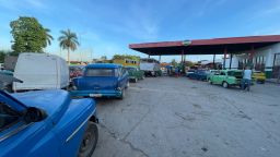 Cuba's famous classic cars form long lines outside the country's gas stations.