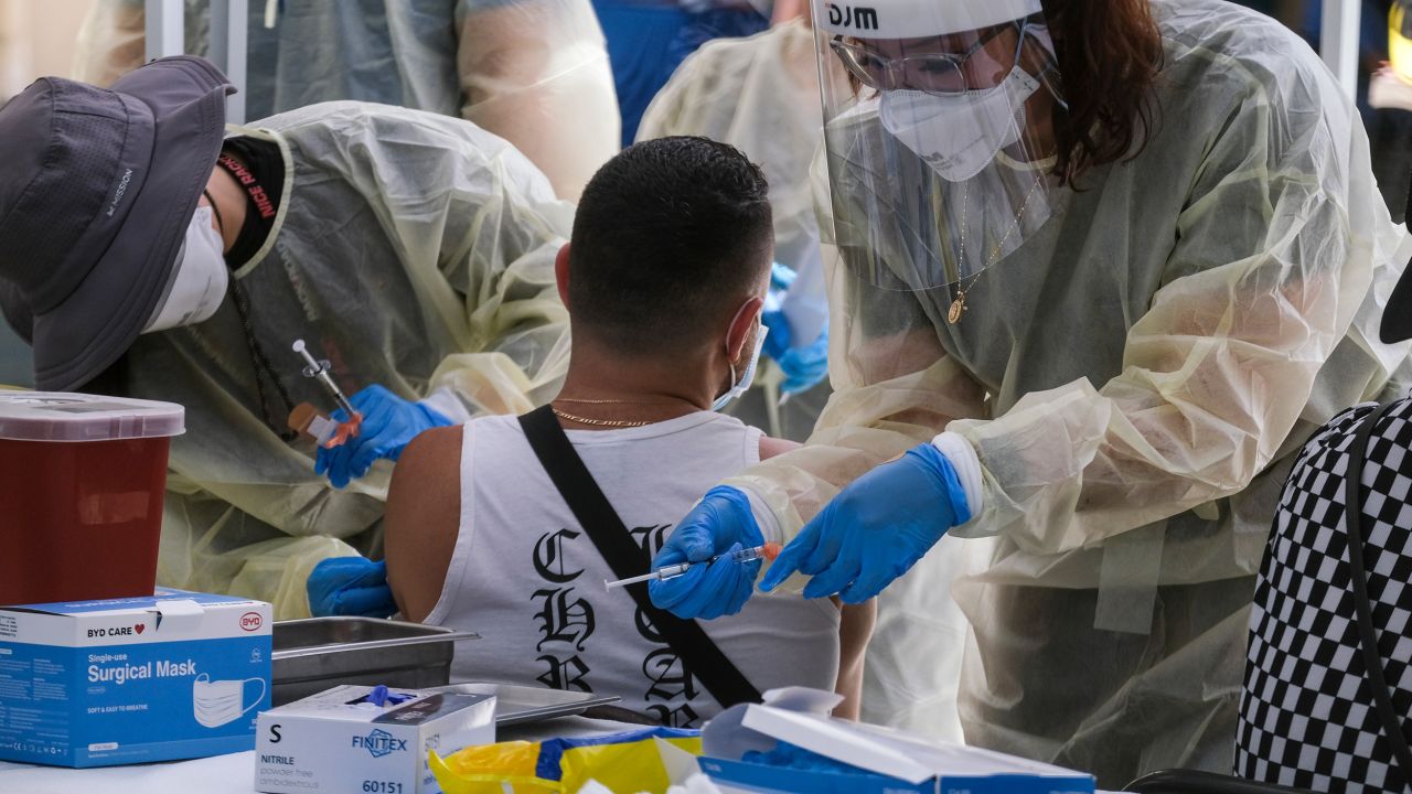 A healthcare worker prepares the Monkeypox vaccine at Eugene A. Obregon Park in Los Angeles on July 20, 2022. (Ringo Chiu via AP)