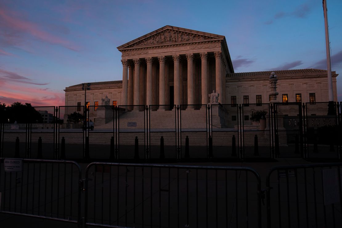 The sun sets in front of the Supreme Court on June 28, 2022, in Washington. A Supreme Court decision last month  overturned the landmark Roe v. Wade ruling and erased a federal right to an abortion. 
