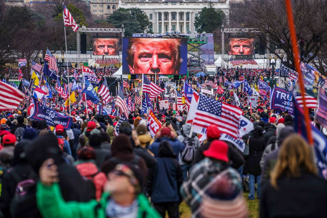 Supporters of then-President Donald Trump  gather on the Ellipse near the White House to hear him speak on January 6, 2021.  
