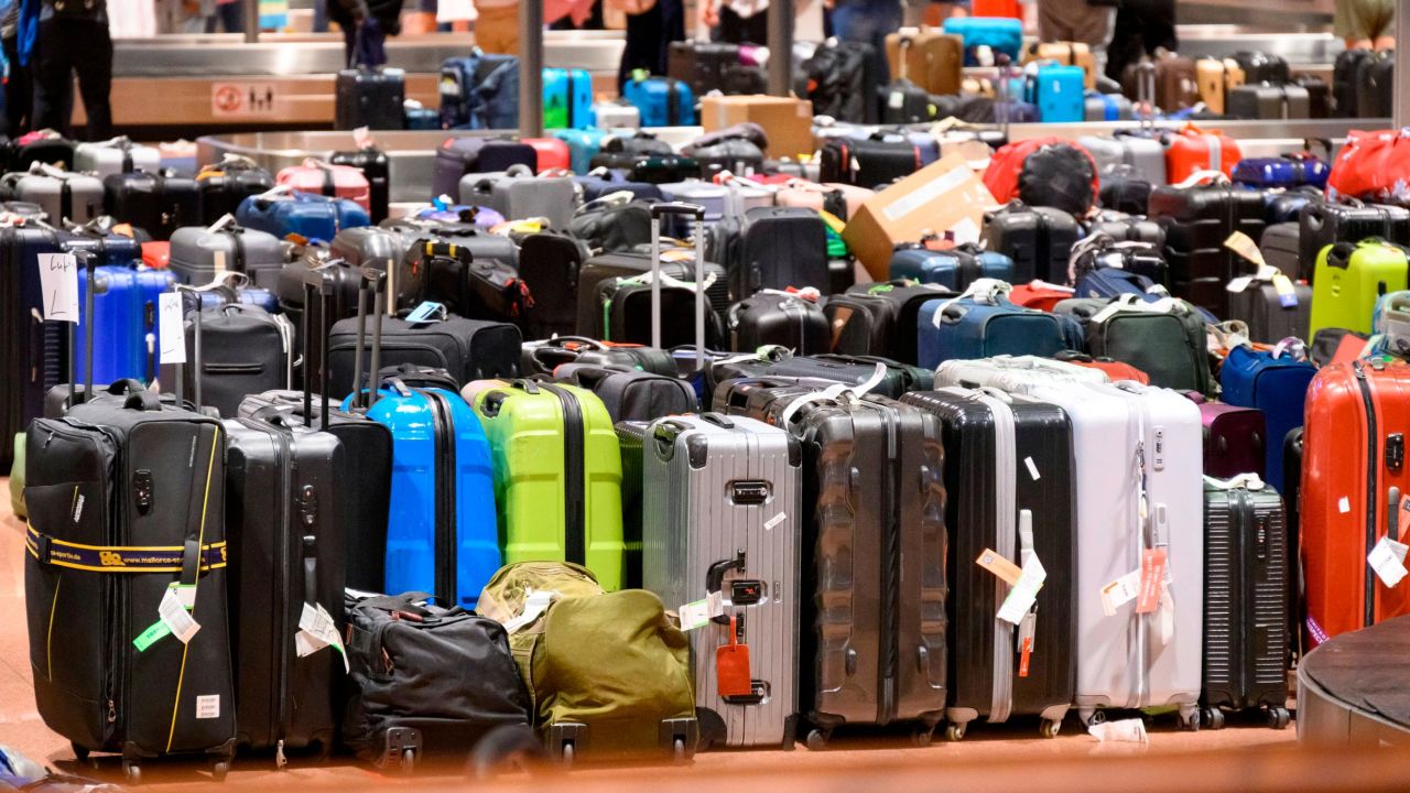 Suitcases can really pile up in a baggage claim area, such as this one in Hamburg, Germany. If your luggage is lost, you can get compensation.
