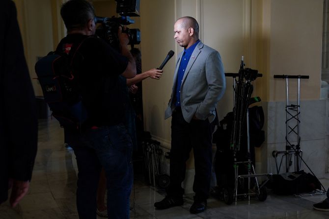 Capitol Police Sgt. Aquilino Gonell speaks to members of the press before the July 21 hearing. Gonell was one of the officers who defended the Capitol on the day of the attack.