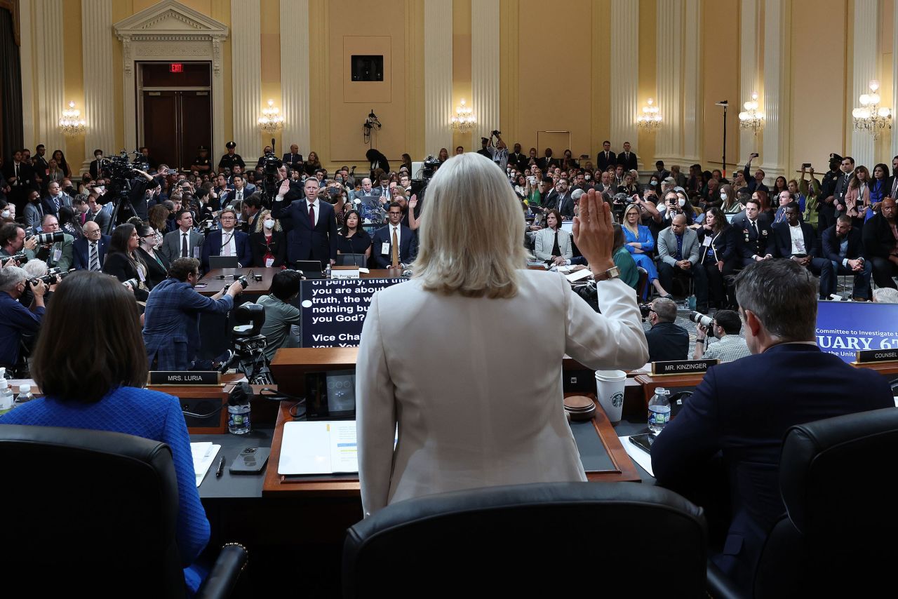 Cheney swears in Matthews and Pottinger on July 21.