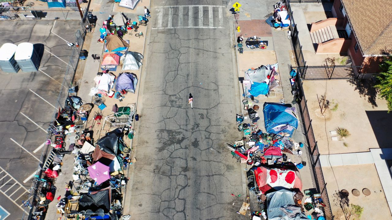 An aerial view of people gathered near a homeless encampment Thursday afternoon in Phoenix, Arizona.