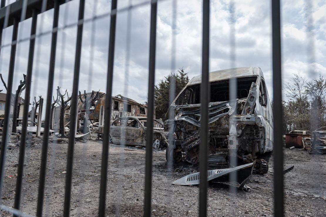 Burned out cars and homes in the aftermath of the wildfire that tore through Dagenham.