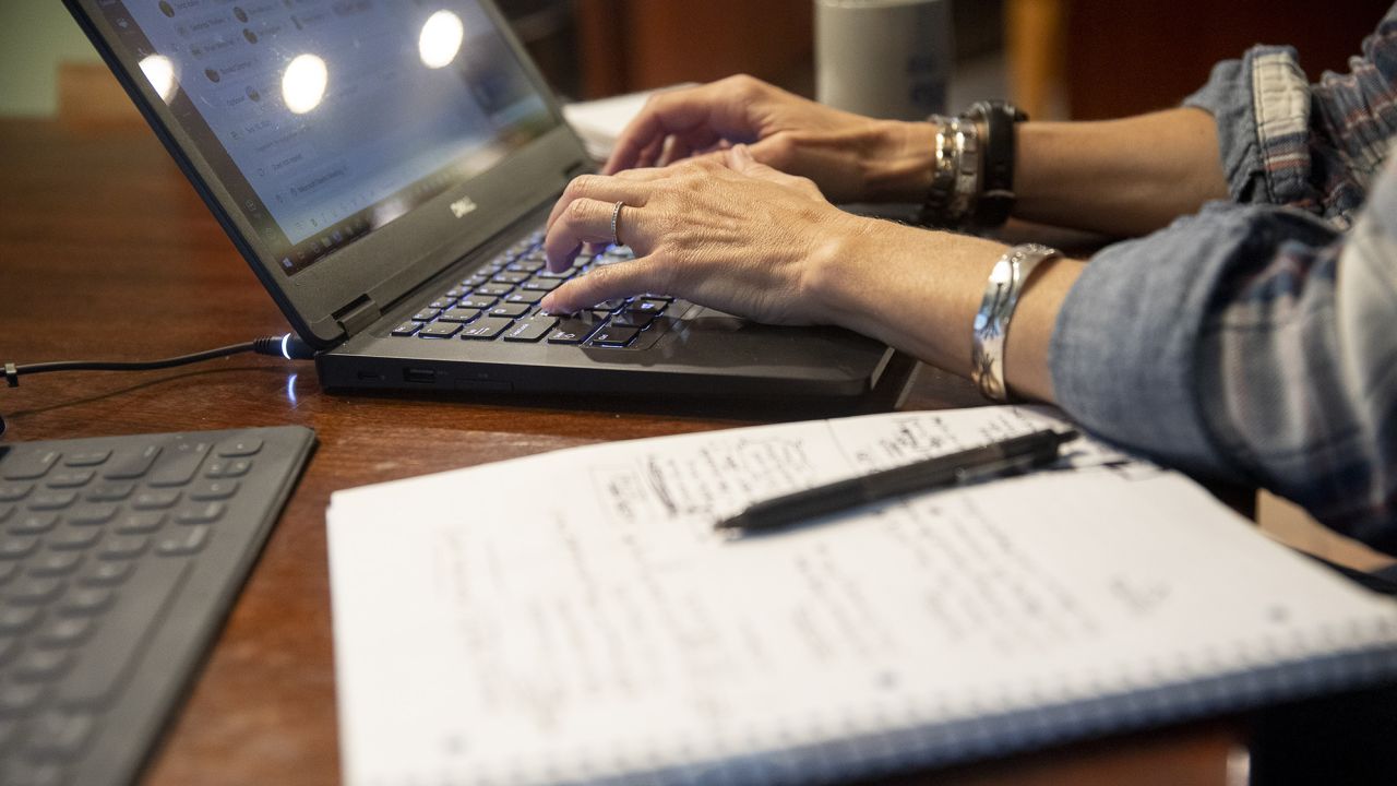 A person uses a laptop computer while working from home in an arranged photograph taken in Tiskilwa, Illinois, U.S., on Tuesday, Sept. 8, 2020.