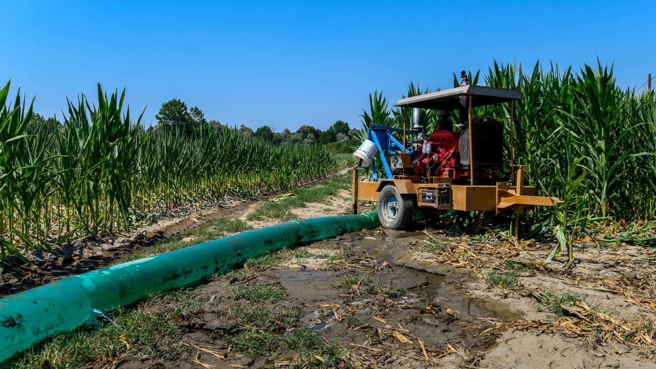 A pump irrigating a corn field in Carmagnola, Italy, on Thursday, July 21. As drier-than-usual conditions and an early summer heat wave wreak havoc on agriculture and power supplies, the Italian government was forced on earlier in July to declare a state of emergency in five regions.