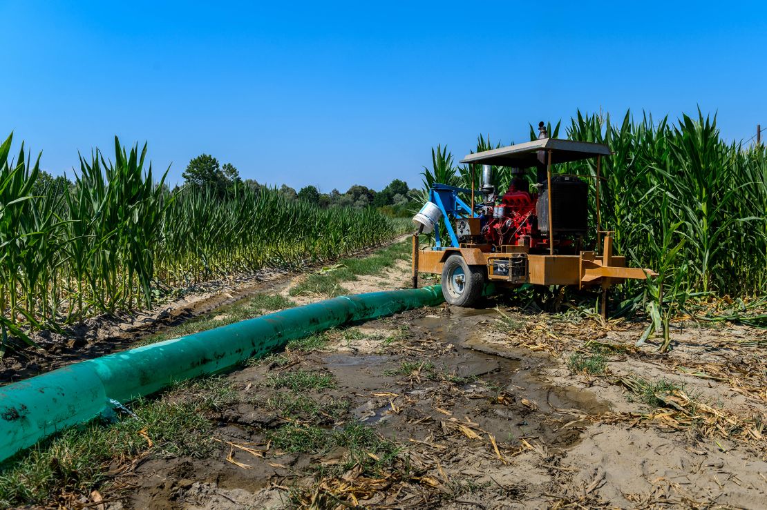 A pump irrigating a corn field in Carmagnola, Italy, on Thursday, July 21. As drier-than-usual conditions and an early summer heat wave wreak havoc on agriculture and power supplies, the Italian government was forced on earlier in July to declare a state of emergency in five regions. 