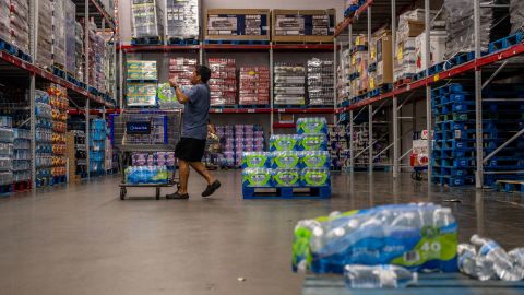 A customer stocks up on bottled water earlier this week in Houston, Texas.