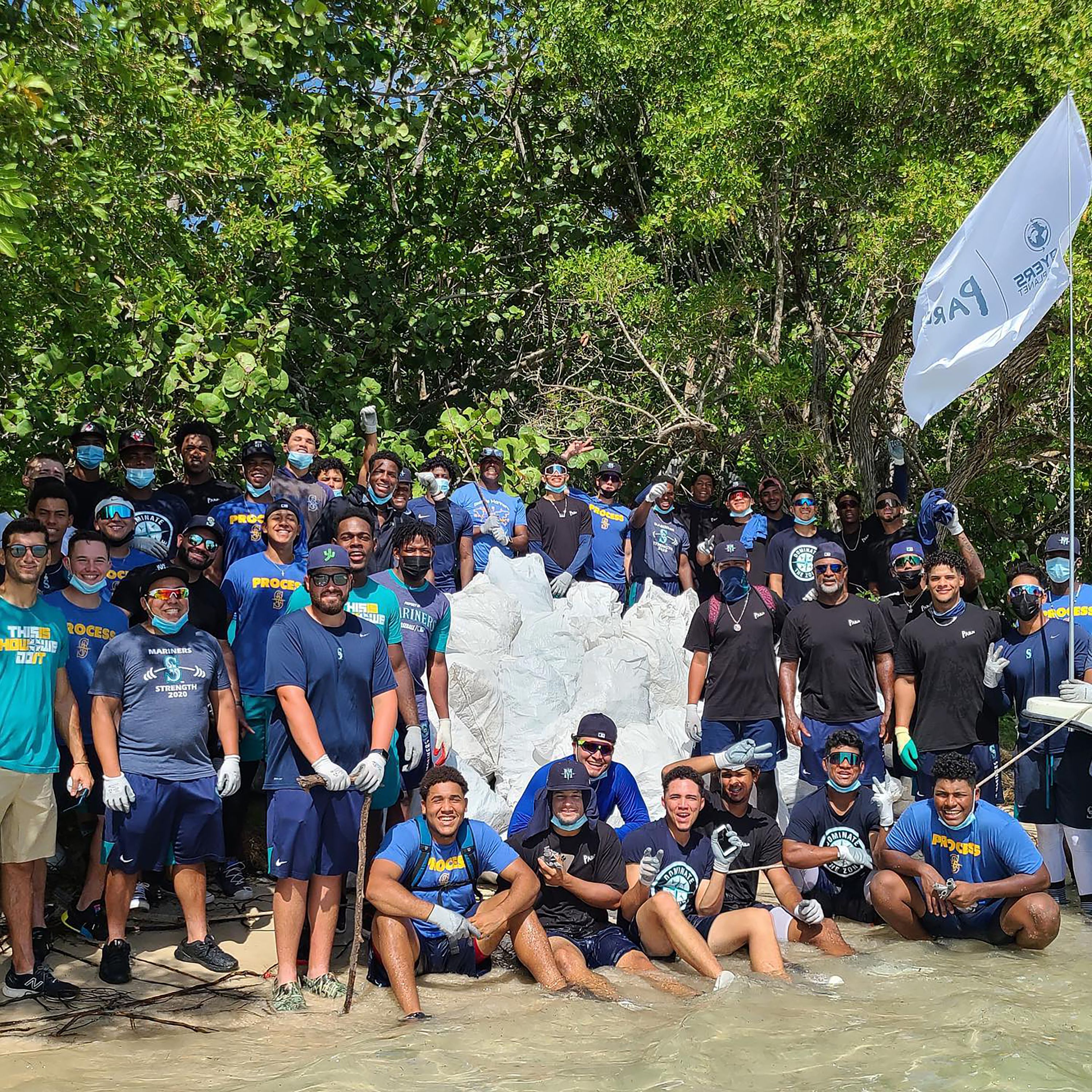 Players for the Planet, an organization dedicated to developing an environmentally sustainable sports industry, participates in a beach cleanup. Founded by former Major League Baseball player <a href="index.php?page=&url=https%3A%2F%2Fwww.playersfortheplanet.org%2Fabout" target="_blank" target="_blank">Chris Dickerson</a>, the group works with professional athletes and sports teams to reduce plastic waste.