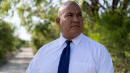 Uvalde school police Chief Pete Arredondo stands on a dirt road on the outskirts of town on June 8, 2022.