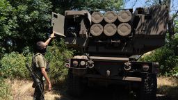 The commander of a Ukranian unit shows the rockets on HIMARS vehicle in Eastern Ukraine on July 1, 2022.  