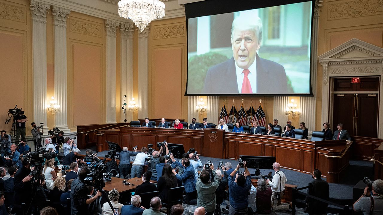 A video of former President Donald Trump is shown on a screen, as the House select committee holds a hearing at the Capitol in Washington on Thursday.