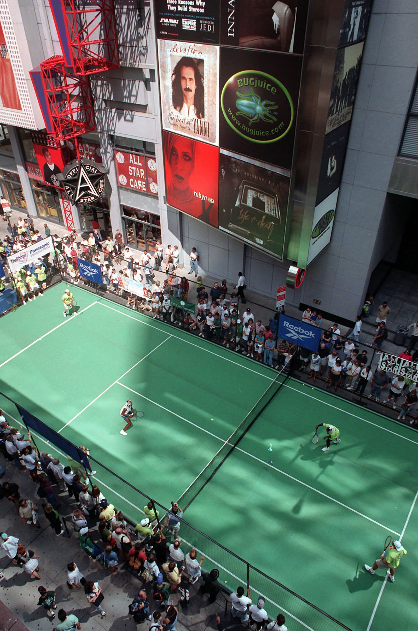 The Williams sisters and the Jensen brothers, Luke and Murphy, play an exhibition in New York's Times Square in 1997. It was part of the lead-up to the US Open.