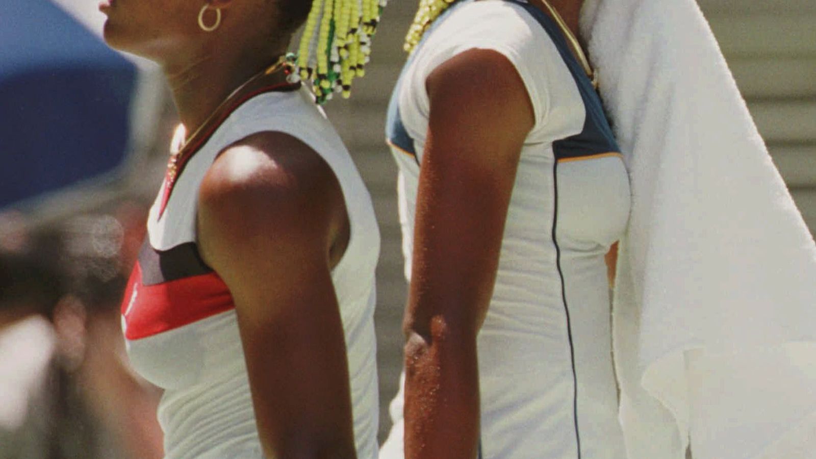 Serena, left, walks past Venus as they played against each other in the second round of the Australian Open in 1998. It was Serena's first grand slam tournament. Venus won the match 7-6, 6-1. 