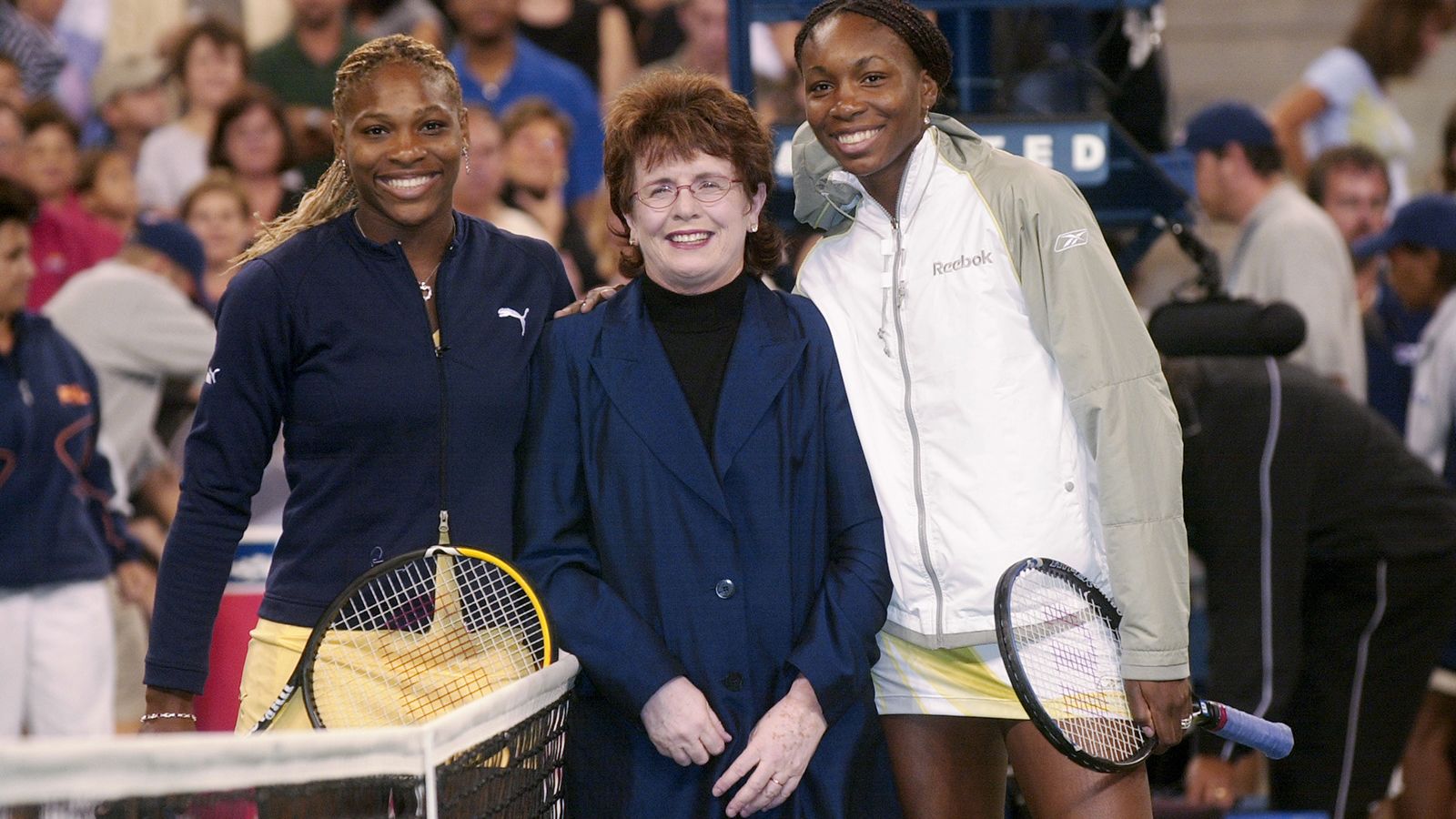 Serena, left, and Venus stand with tennis great Billie Jean King after Venus defeated Serena to win the US Open final in 2001. It was Venus' fourth grand slam singles title.