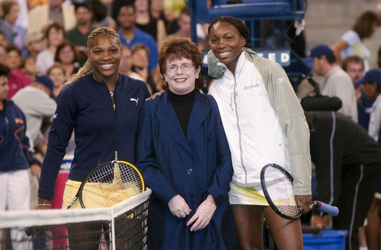 Serena, left, and Venus stand with tennis great Billie Jean King after Venus defeated Serena to win the US Open final in 2001. It was Venus' fourth grand slam singles title.