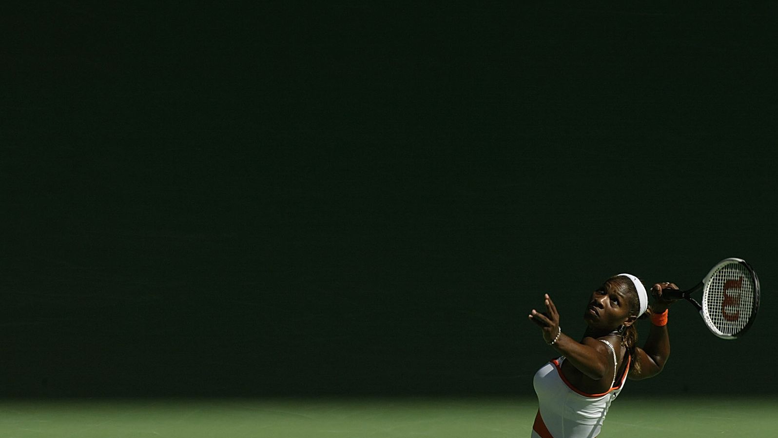 Serena serves during the Australian Open in 2003. She defeated her sister Venus in the final that year.