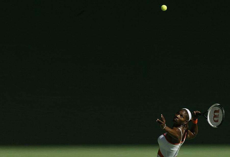 Serena serves during the Australian Open in 2003. She defeated her sister Venus in the final that year.