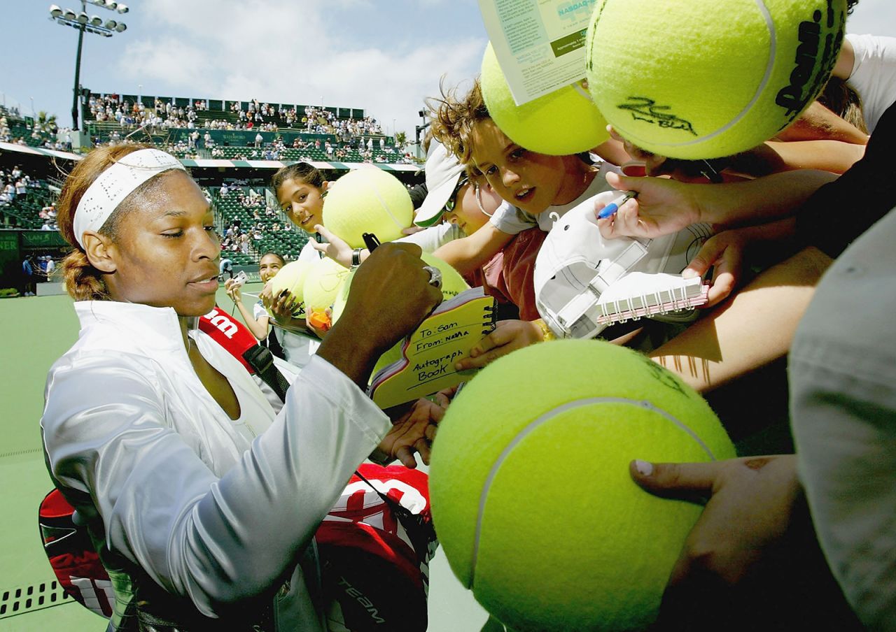 Serena signs autographs after a match in Key Biscayne, Florida, in 2004.